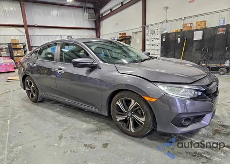 2017 Honda Civic Touring z USA, uszkodzony, nr VIN 19XFC1F9XHE013158